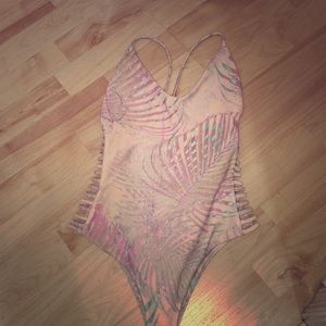 One piece with side cut outs